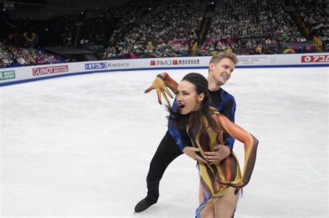 US pair of Chock and Bates win first world ice dance title